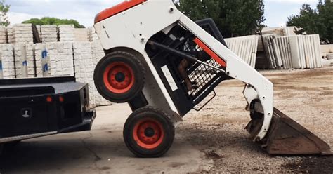 unloading skid steer without ramps|Loading a Bobcat .